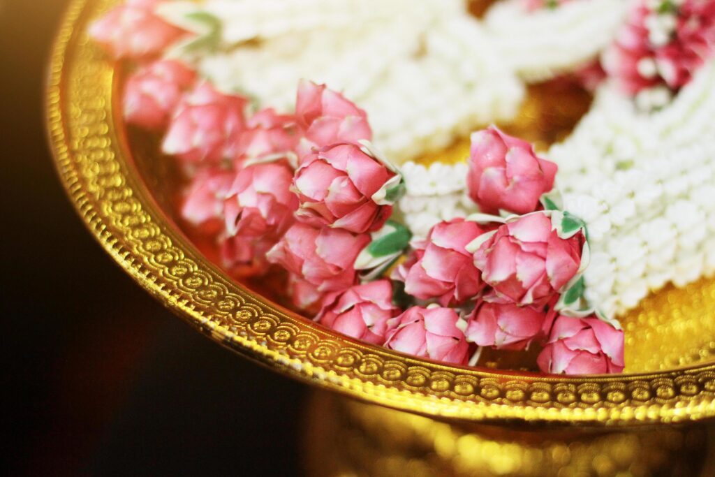 Flower garlands on a gold tray in tradition Thai wedding ceremony day. Jasmine garland. Stock Free