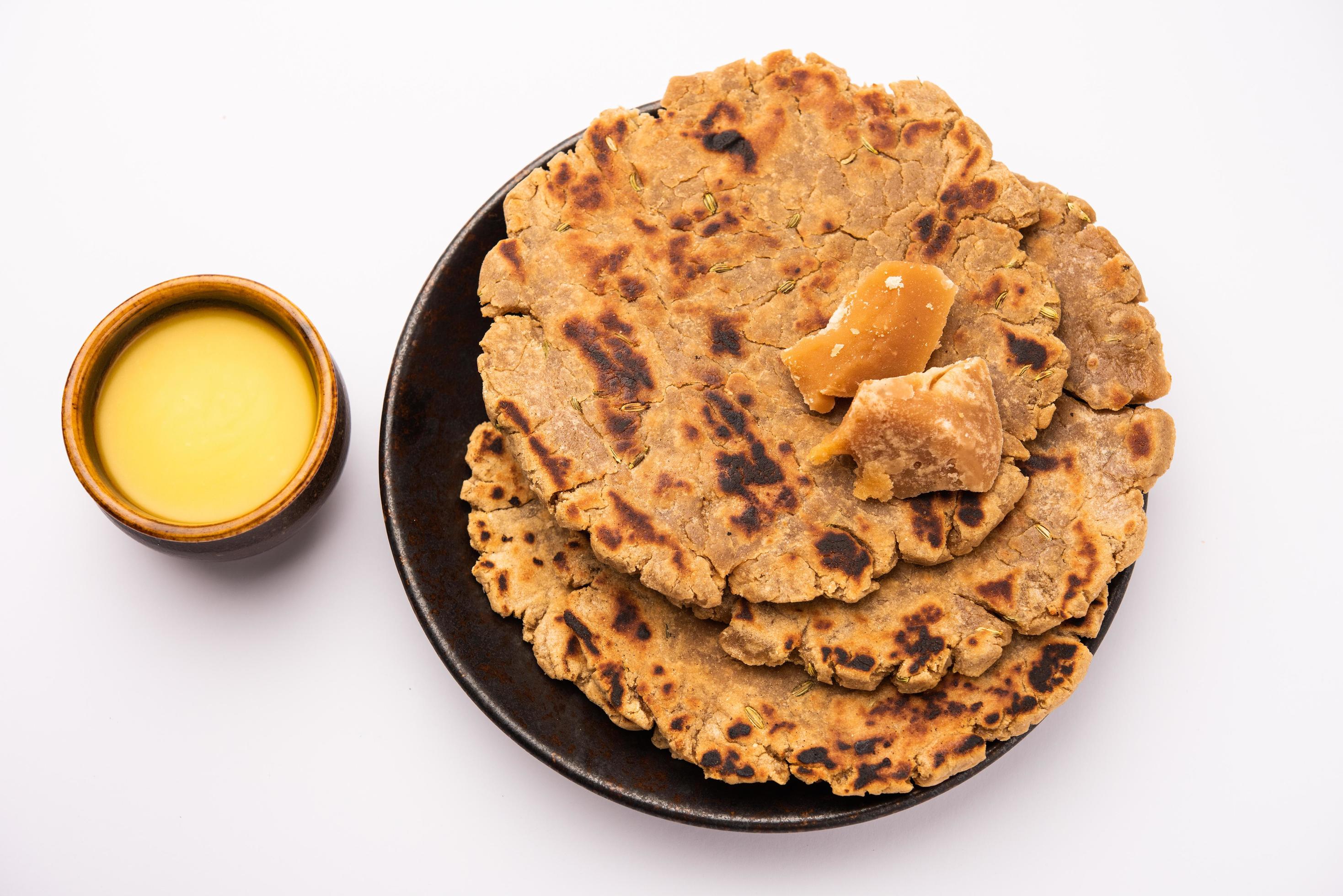 Sweet roti made out of rice flour, jaggery, and ghee. Gud ki roti. gur ki roti, jaggery Bhakri, meethi gud ki roti. Winter food. Copy space. Stock Free