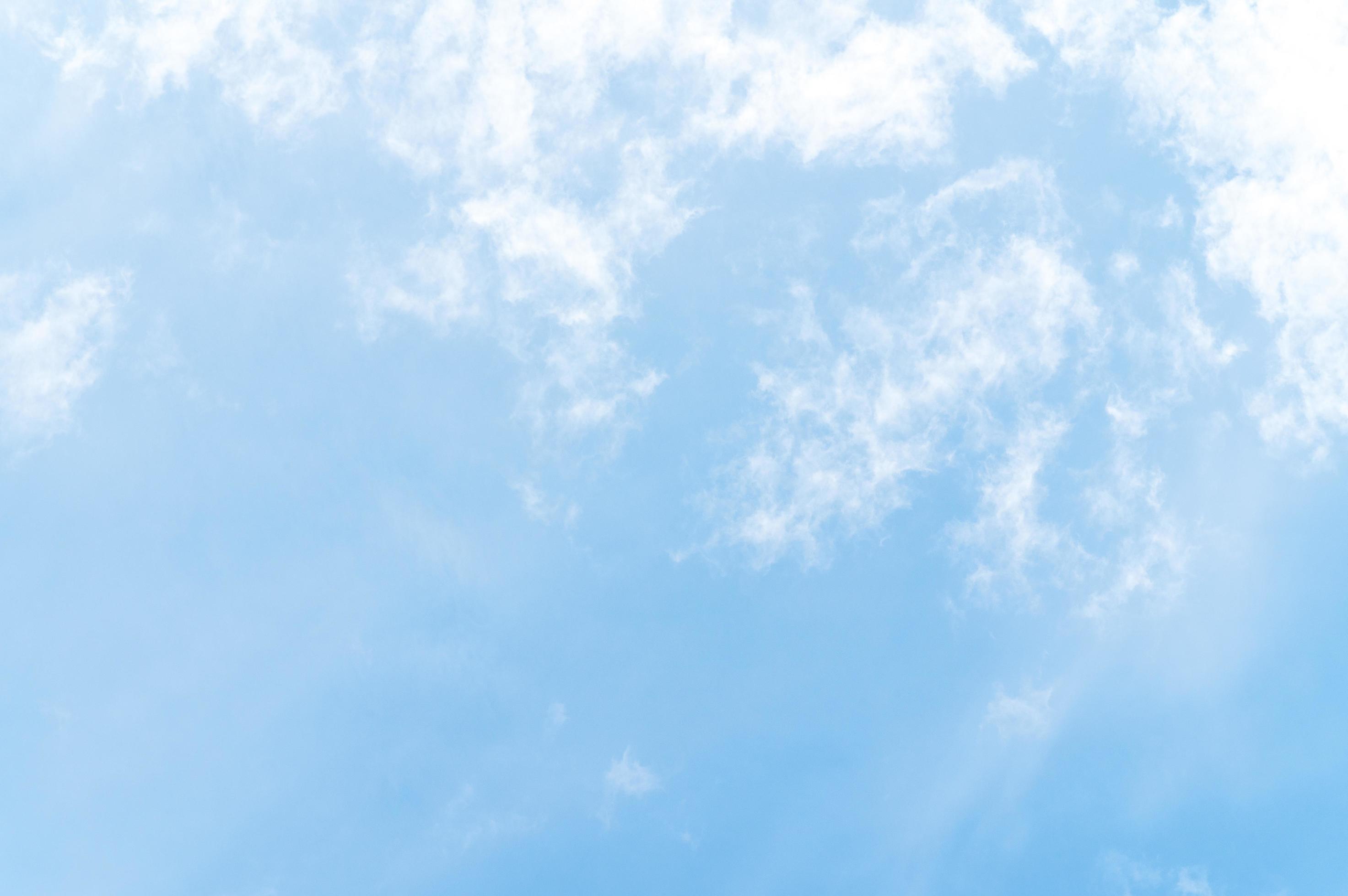 Beautiful white fluffy clouds in blue sky. Nature background from white clouds in sunny day Stock Free