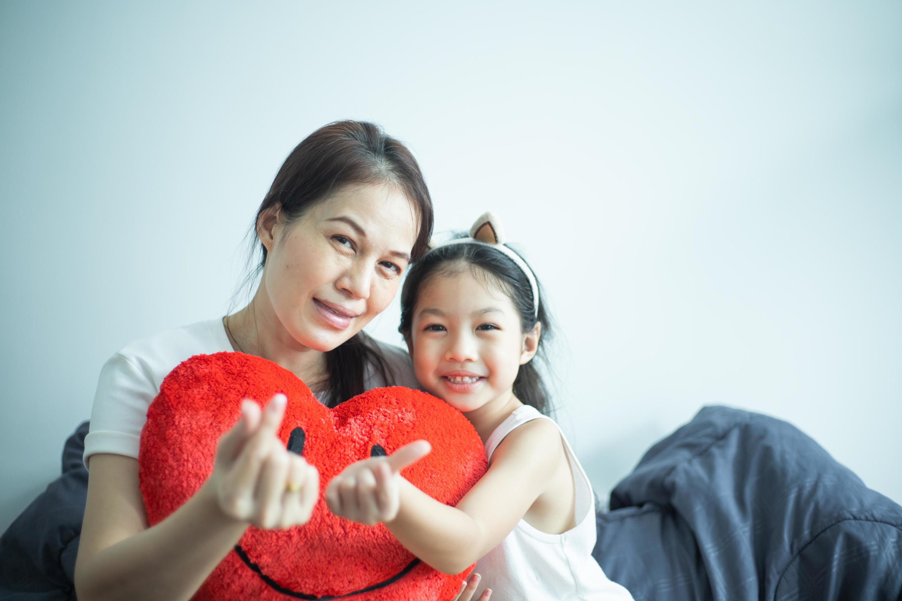 Mother and daughter playing at home. social distance concept. Stock Free