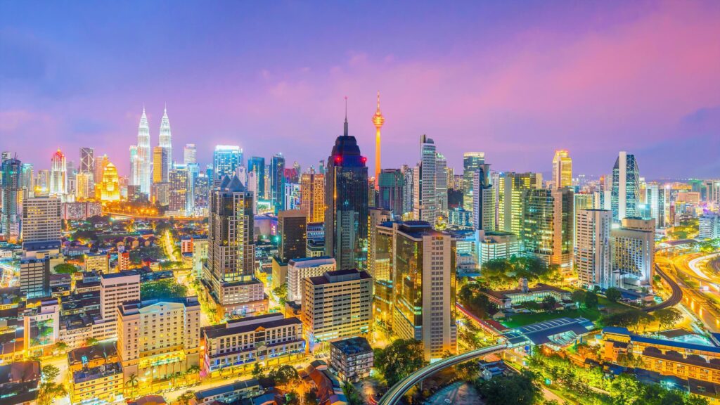 Downtown Kuala Lumpur skyline at twilight Stock Free