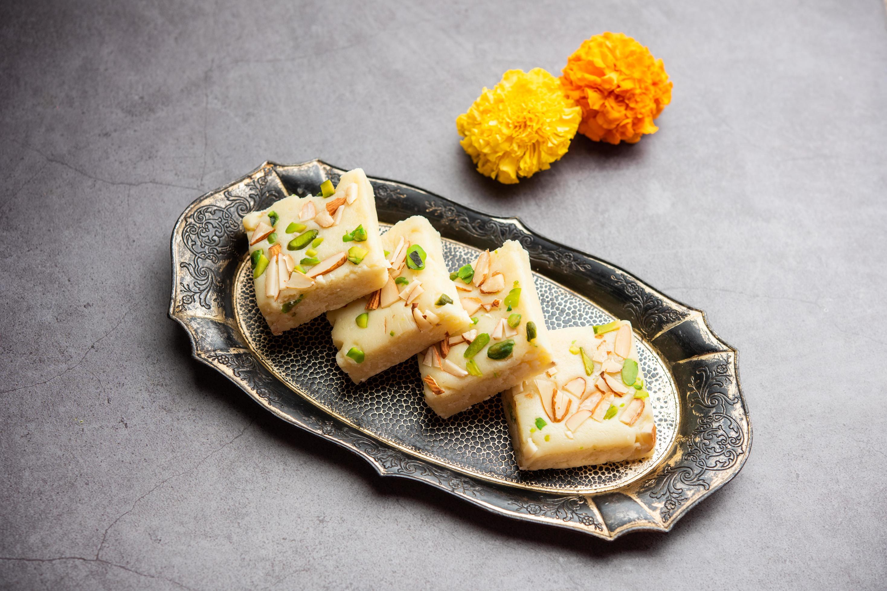 Milk powder barfi also known as Mava burfi, white Khoya burfi or Barfee, Indian Sweet food Stock Free