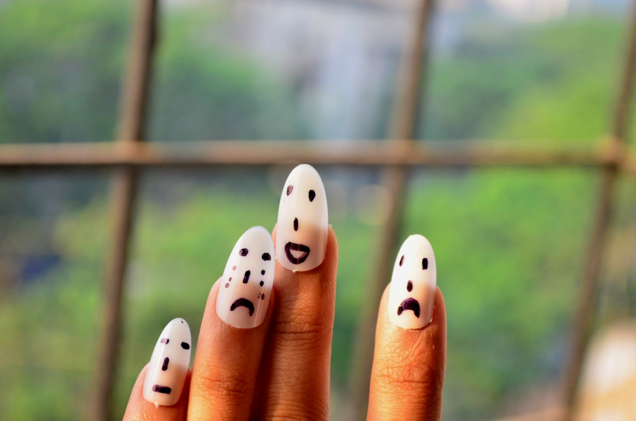 Smiley Faces Hand Nails Stock Free