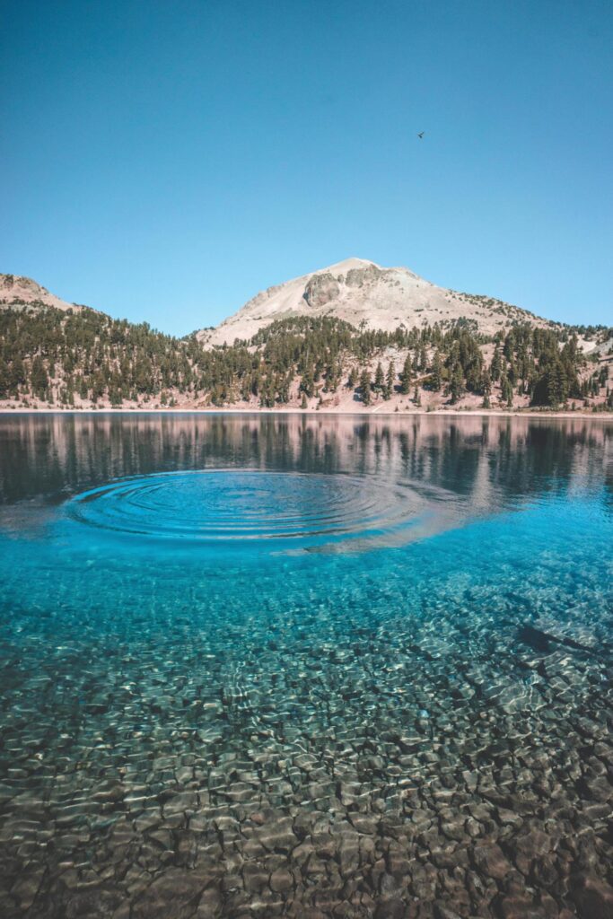 A ripple in glacial mountain water Stock Free