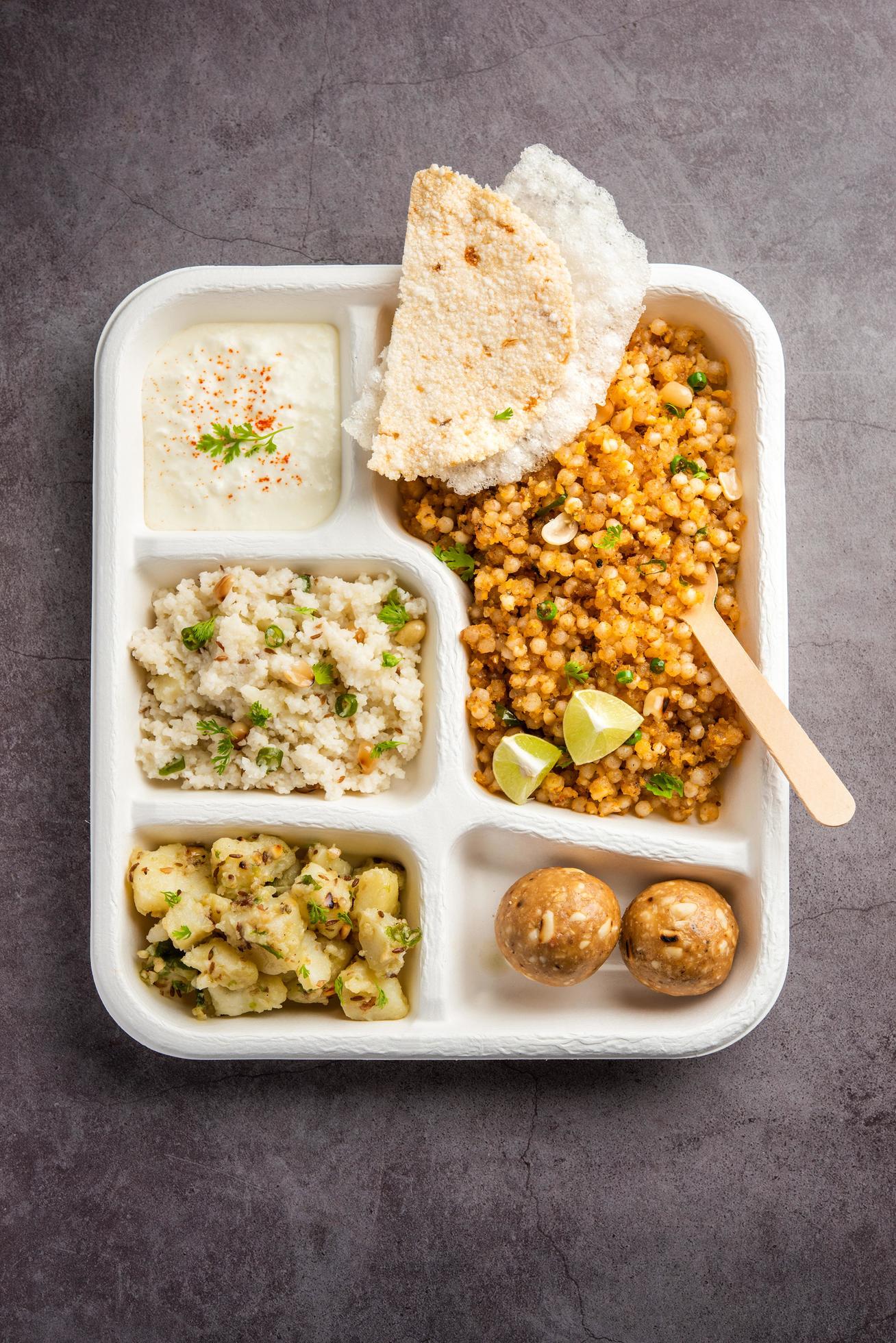 Indian Upwas thali, fasting food platter or thali for home delivery or takeaway parcel for any Vrat Stock Free