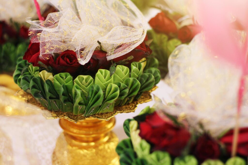 Beautiful flowers decoration on Engagement gold bowl for Thai engagement ceremony.Thai wedding culture tradition Stock Free