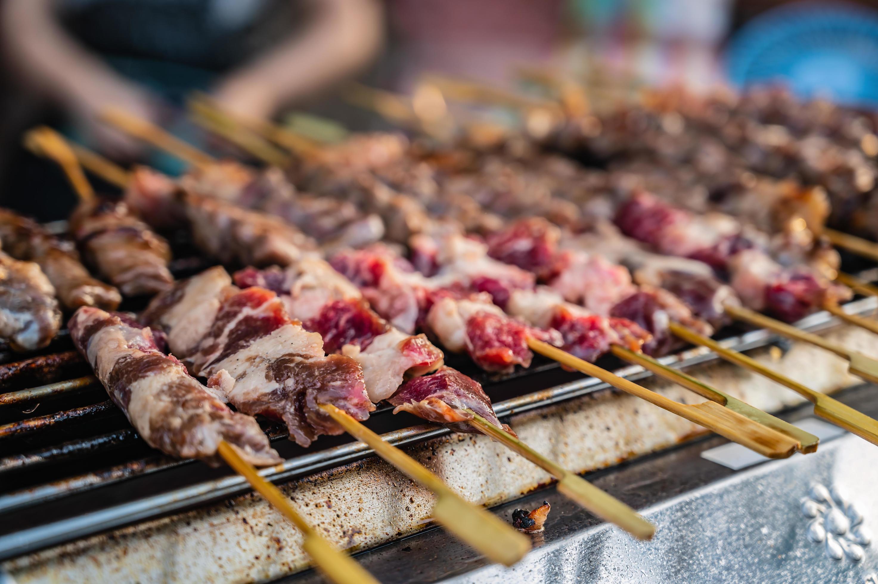 Close up raw beef skewers on the stove.Street food on the walking street Stock Free