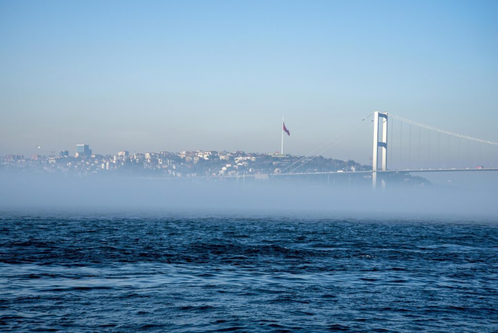 The fog over the Bosphorus Strait, the background on the bridge, and high-rise buildings. Stock Free