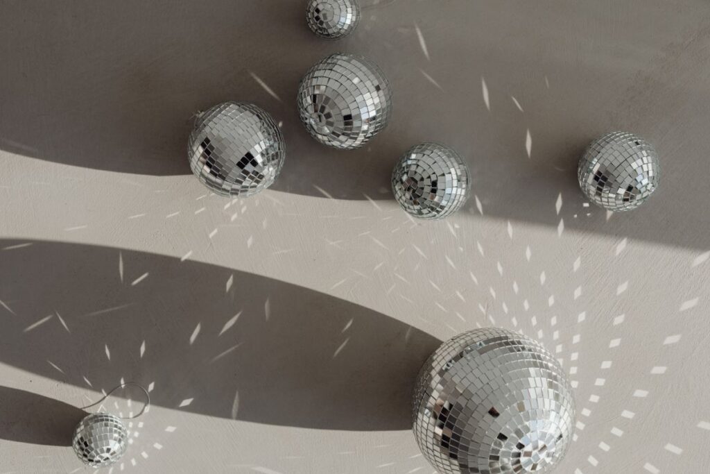 New Year’s Eve party mess – confetti – disco balls Stock Free