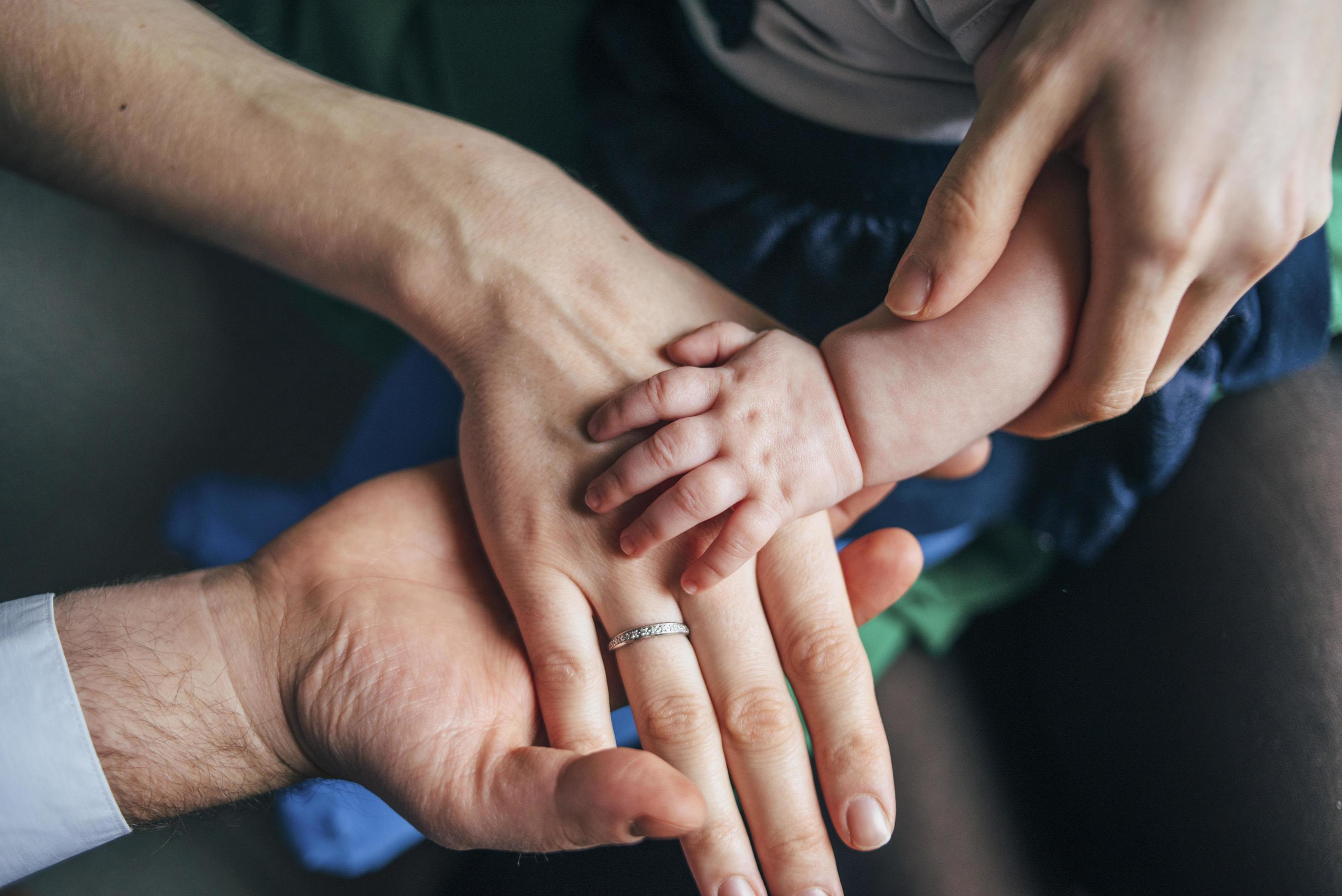 Family of three’s hands Stock Free