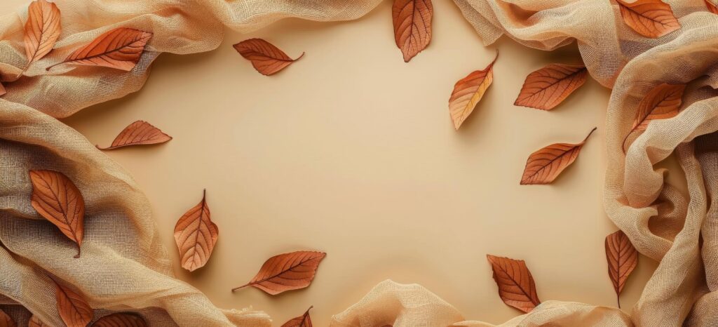 Dried Autumn Leaves and Burlap Fabric on White Background Stock Free