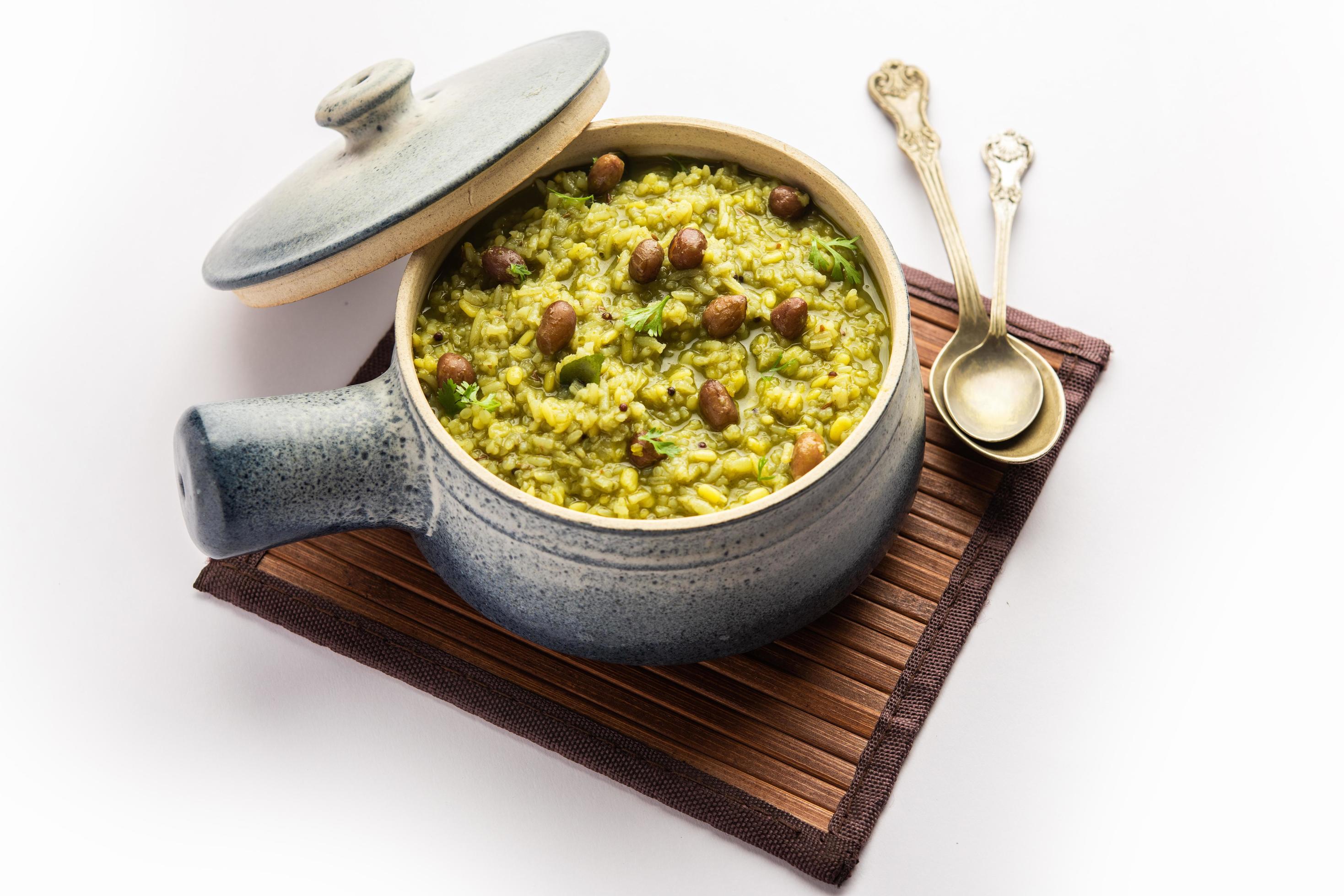 Palak khichdi is a one pot nutritious meal of mung lentils and rice with spinach, Indian food Stock Free