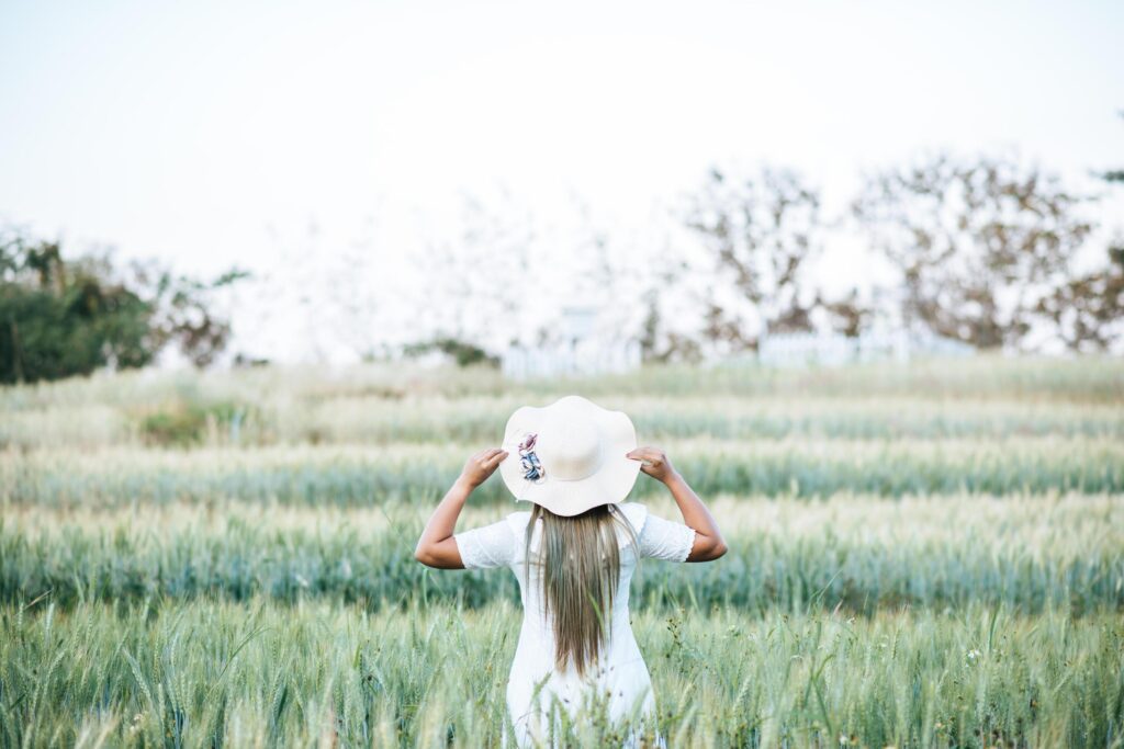 Woman in the hat happiness in the nature Stock Free