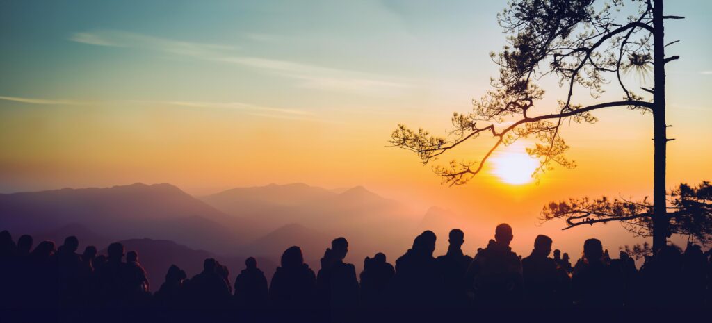 People watching Sunrise in the morning. Tourists travel relax in the holiday. photograph sunrise in the morning among people. Thailand Stock Free