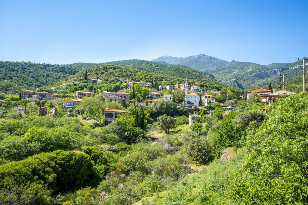 The landscape of Doganbay village and stone house on a summer and sunny day. Stock Free