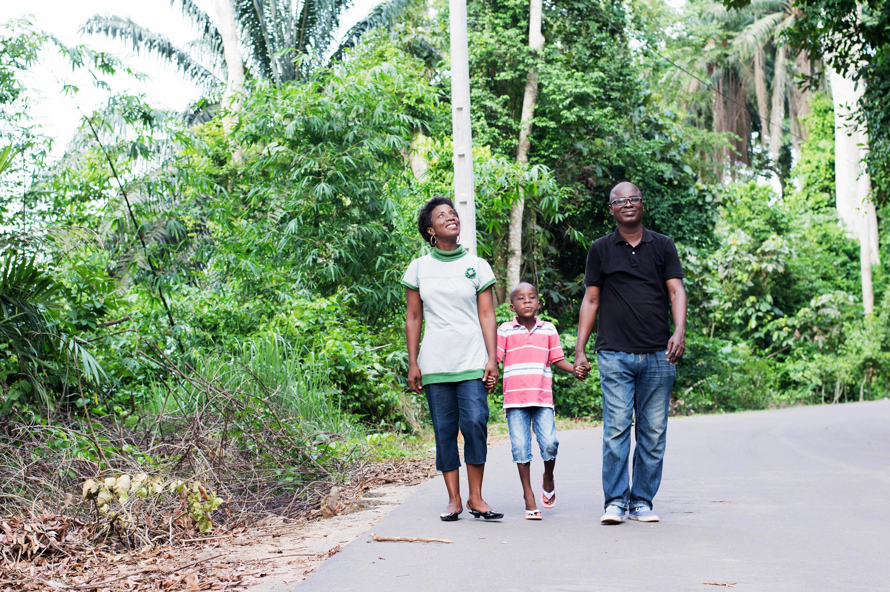 happy family in the countryside ride. Stock Free