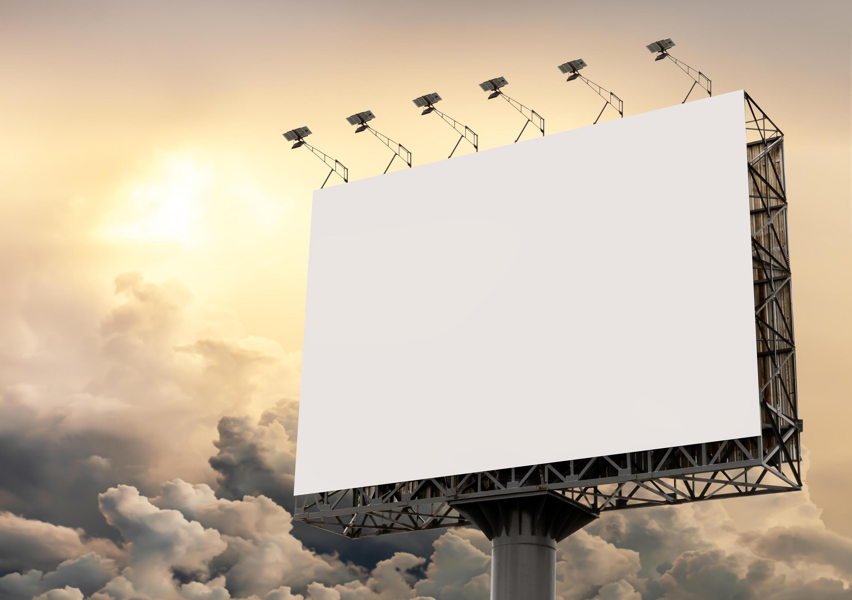 Billboard pole with yellow sky background Stock Free