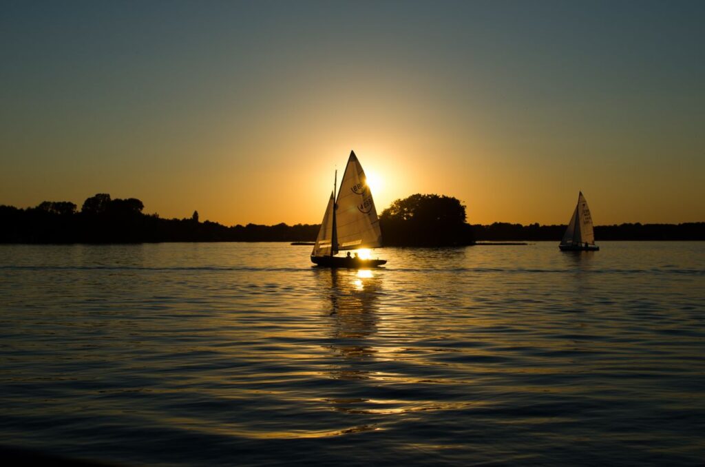 Sailing boats at sunset Stock Free