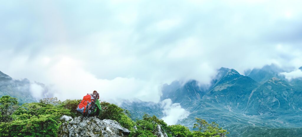 Asian woman Travel photograph Nature. travel relax in the holiday walk in the forest. on a rocky cliff. Thailand Stock Free