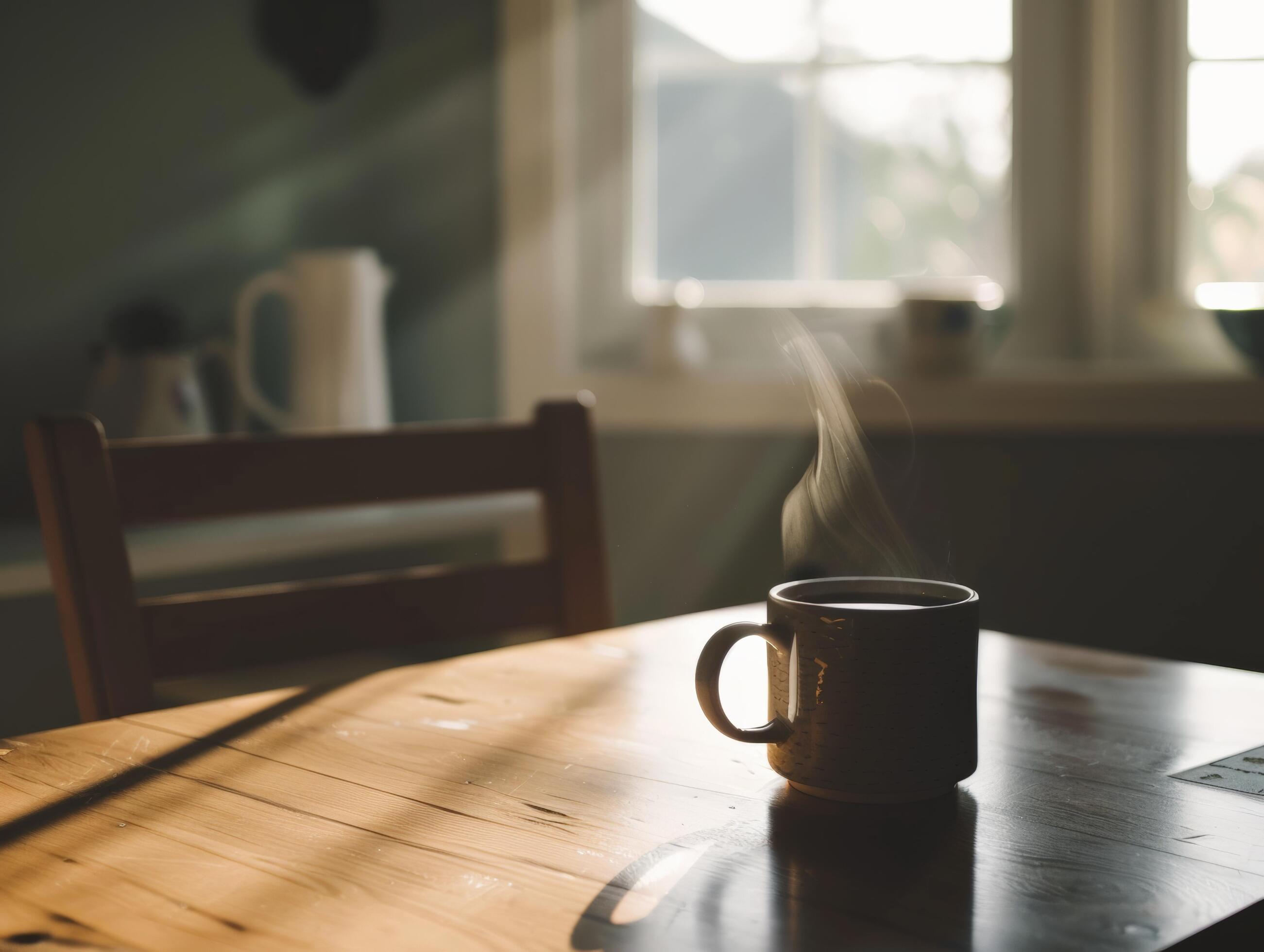 Sunlit kitchen featuring a wooden table with a coffee cup, natural light and cozy atmosphere, home and lifestyle concepts Stock Free