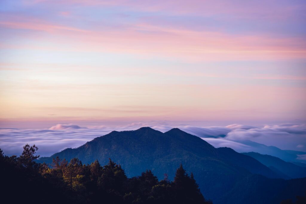 The background of nature with fog on the mountain. In the rainy weather in the countryside. winter Stock Free