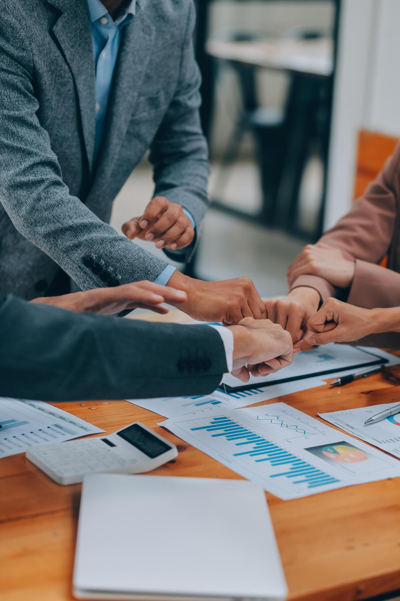 Business people join hand together during their meeting Stock Free