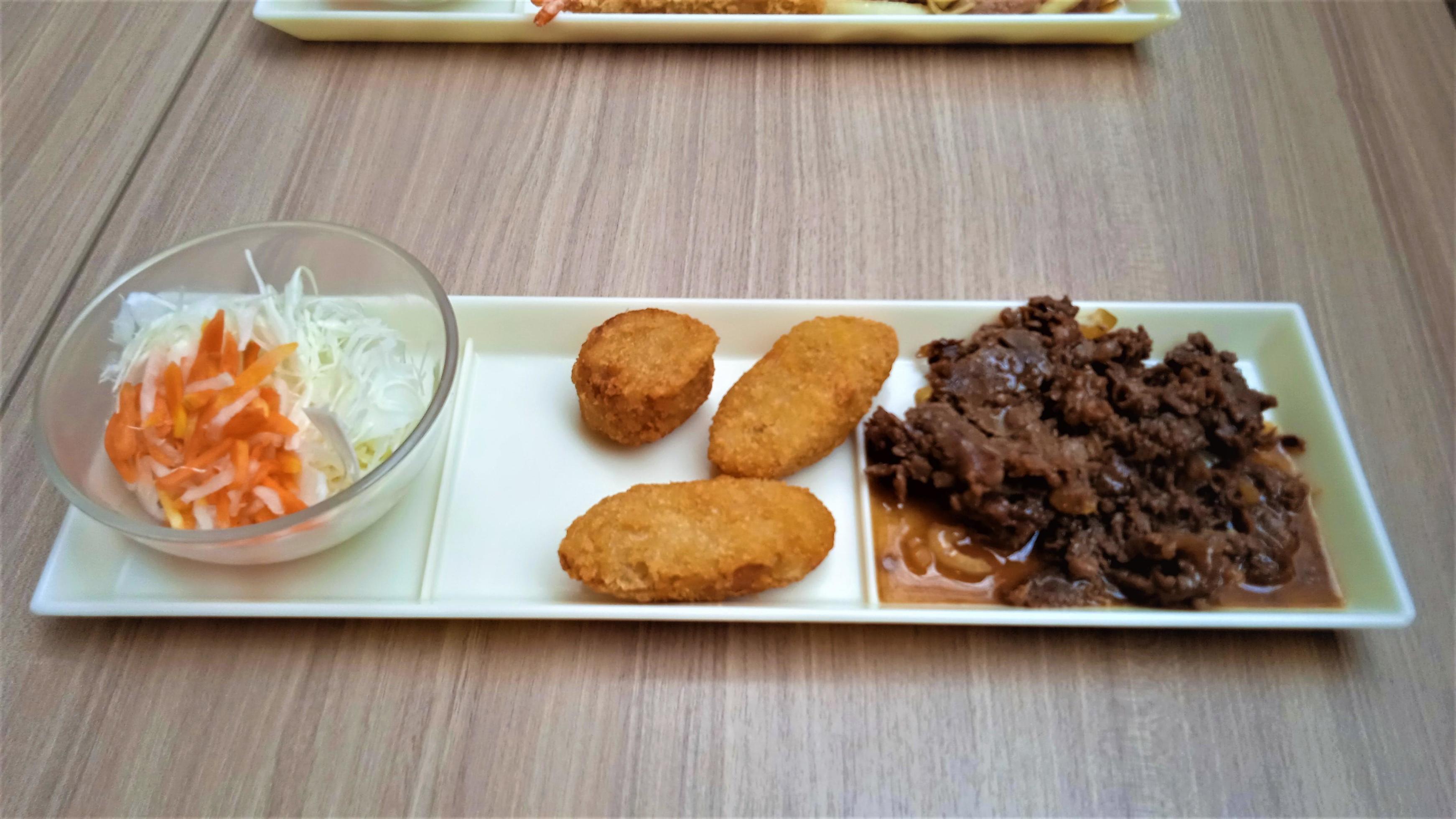 Japanese food on a wooden table, in a Japanese restaurant Stock Free