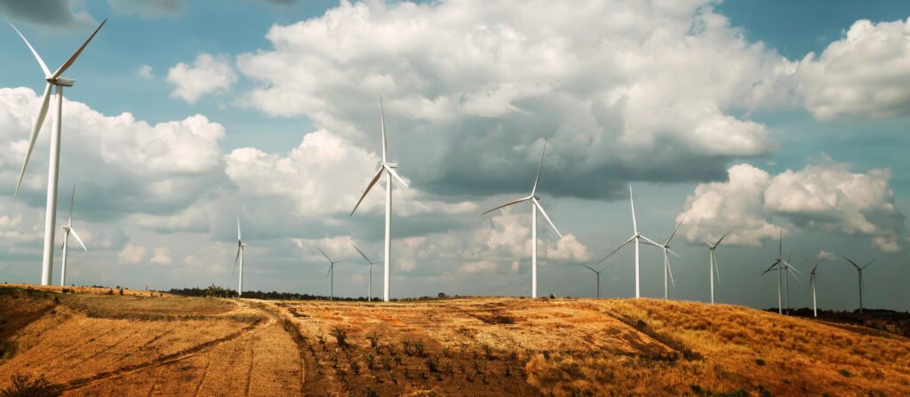 panorama wind turbine on hill. energy power in nature. eco concept Stock Free