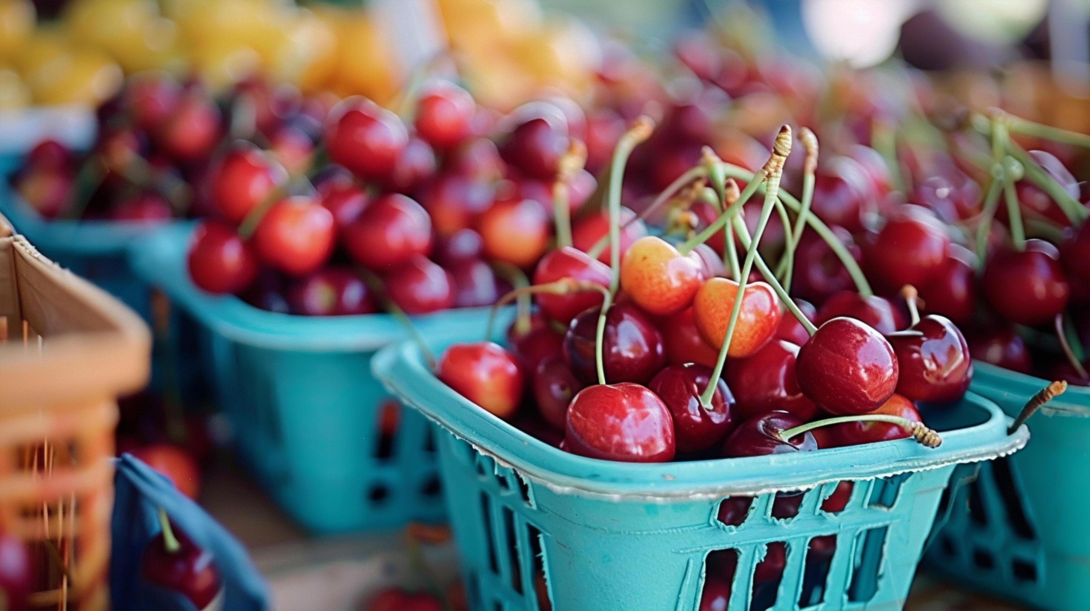 Cherry baskets at a farmer’s market, healthy lifestyle, suitable for food-related advertising and editorial use Stock Free