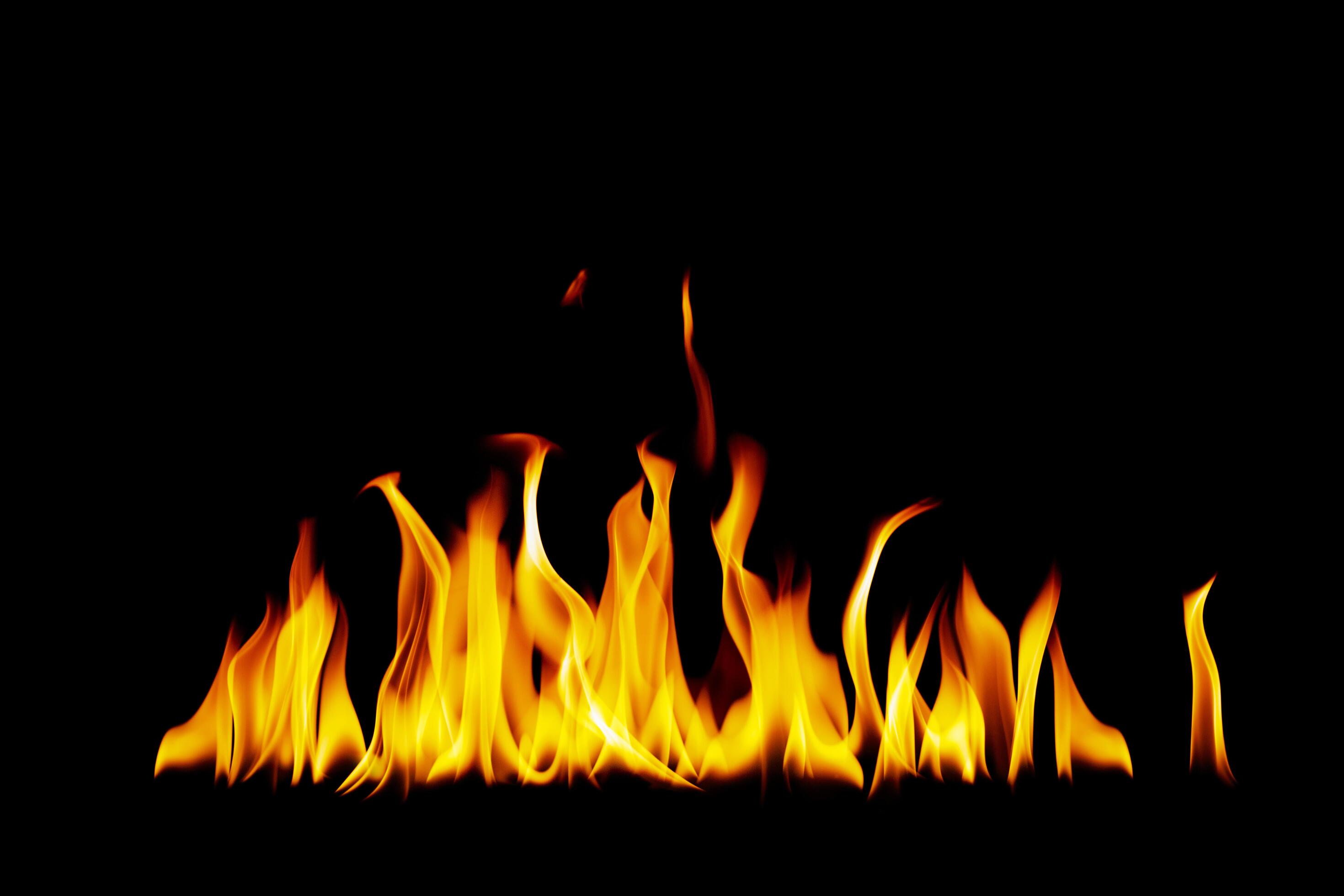 fire burning flame Isolated on a black background Stock Free