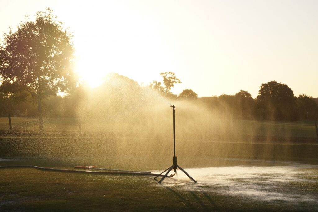 Watering the golf course Stock Free