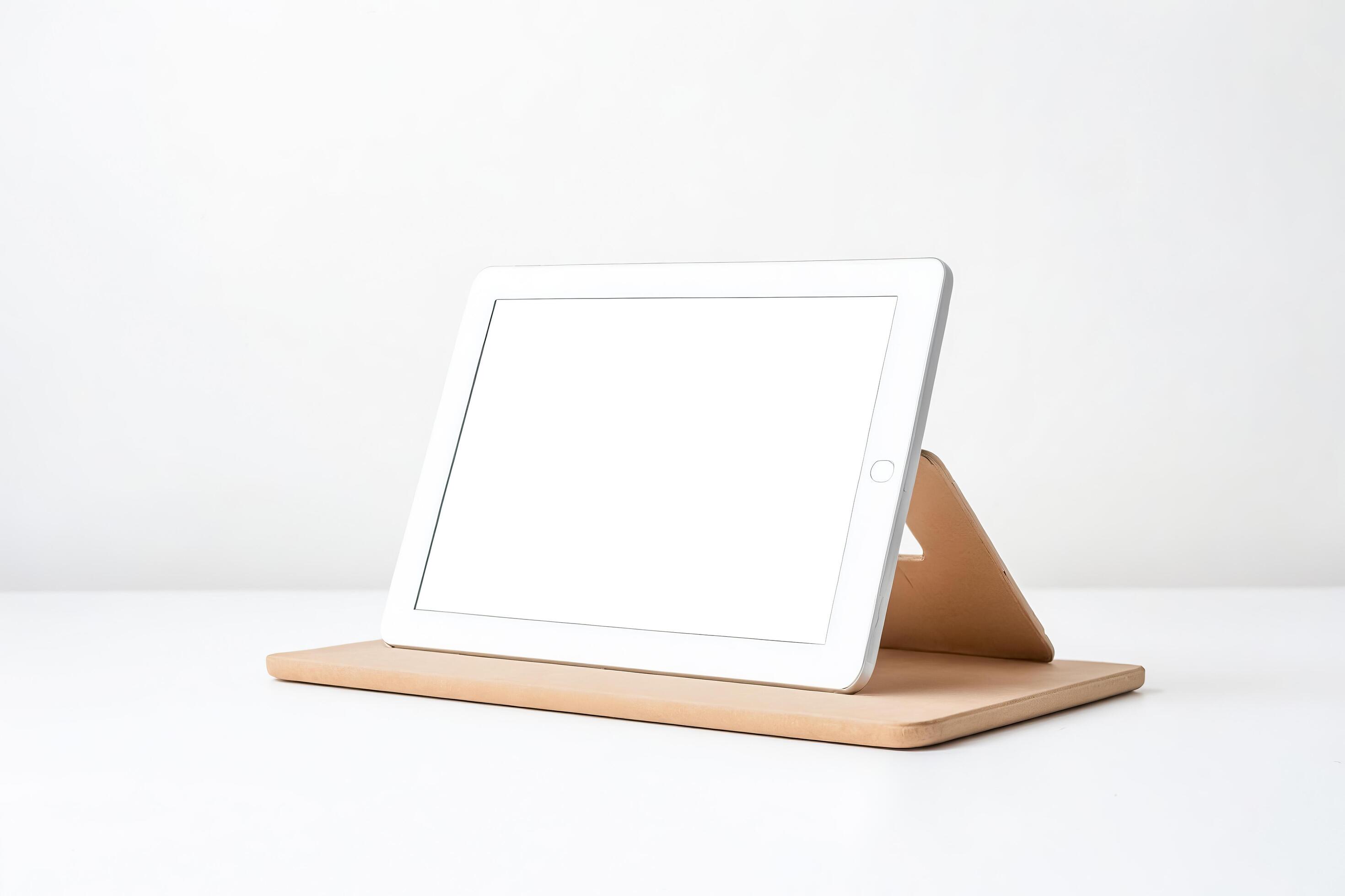 White Tablet on Tan Stand Against a White Background Stock Free