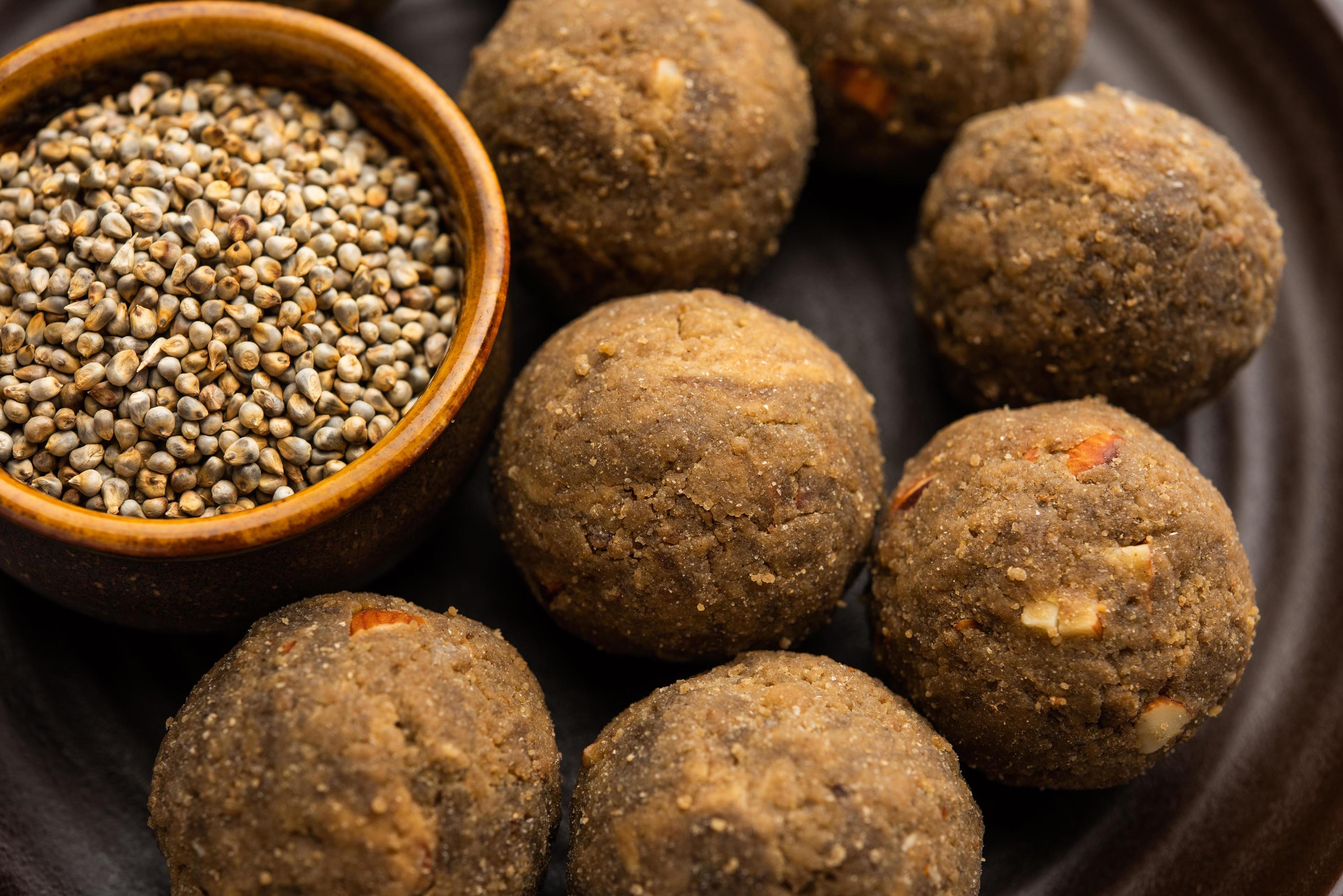 Bajra Atta Ladoo or kuler laddoo – Millet Flour Laddu, a popular winter sweet snack food from India Stock Free