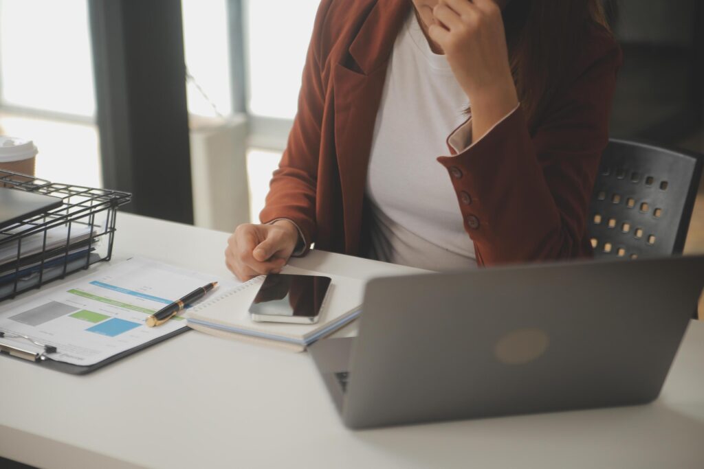 Shot of a asian young business Female working on laptop in her workstation. Stock Free