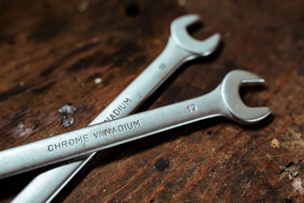 Tools, nails and bolts in a workshop Stock Free