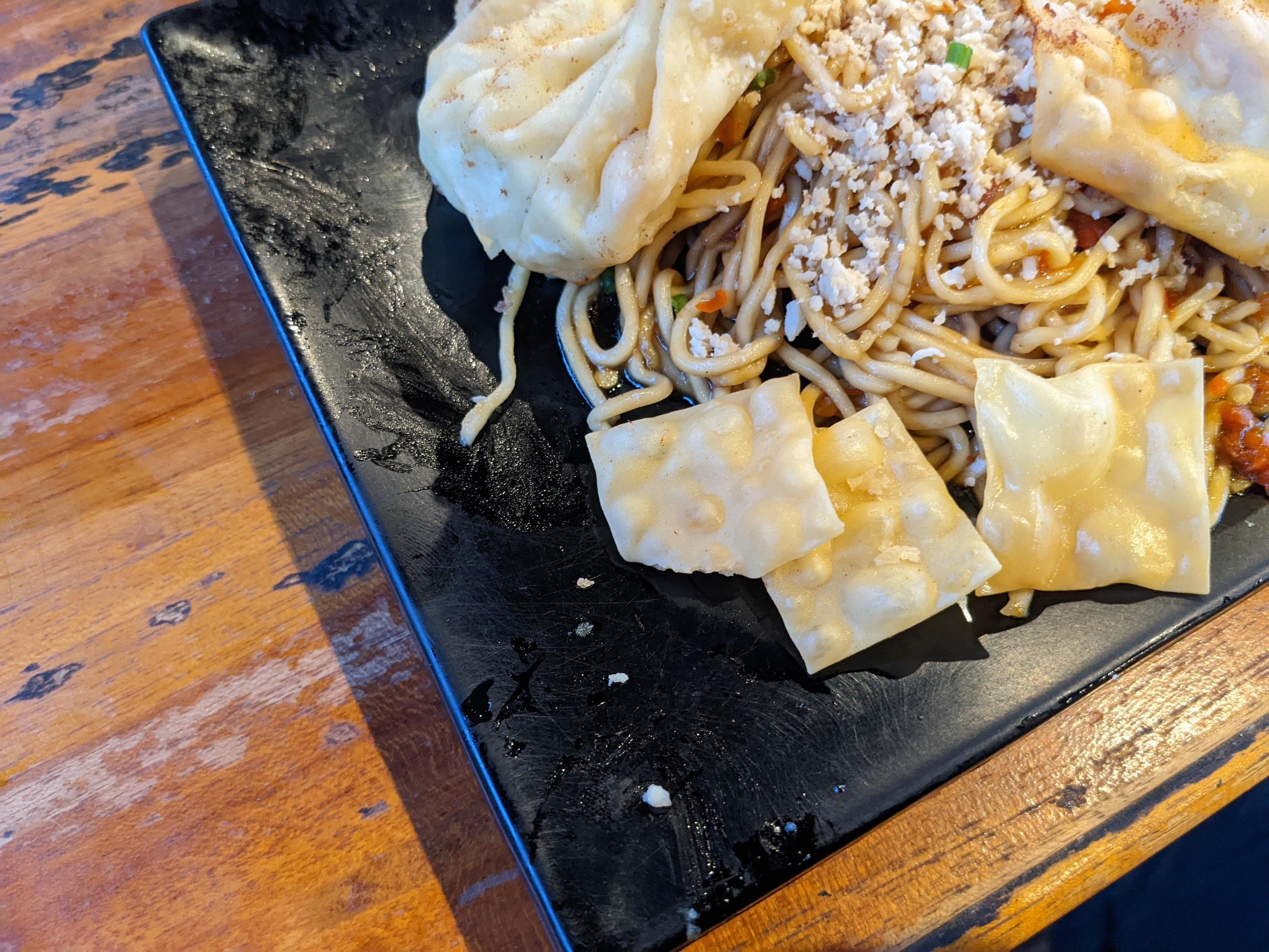 Close up photo of traditional spicy noodle from Indonesia. The photo is suitable to use for traditional food background, poster and food content. Stock Free