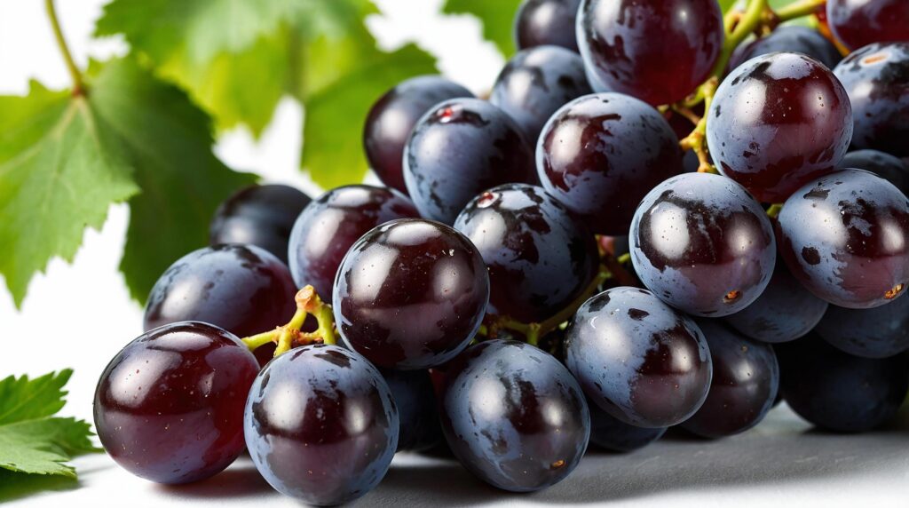 grapes with green leaves on a white absolud background Stock Free