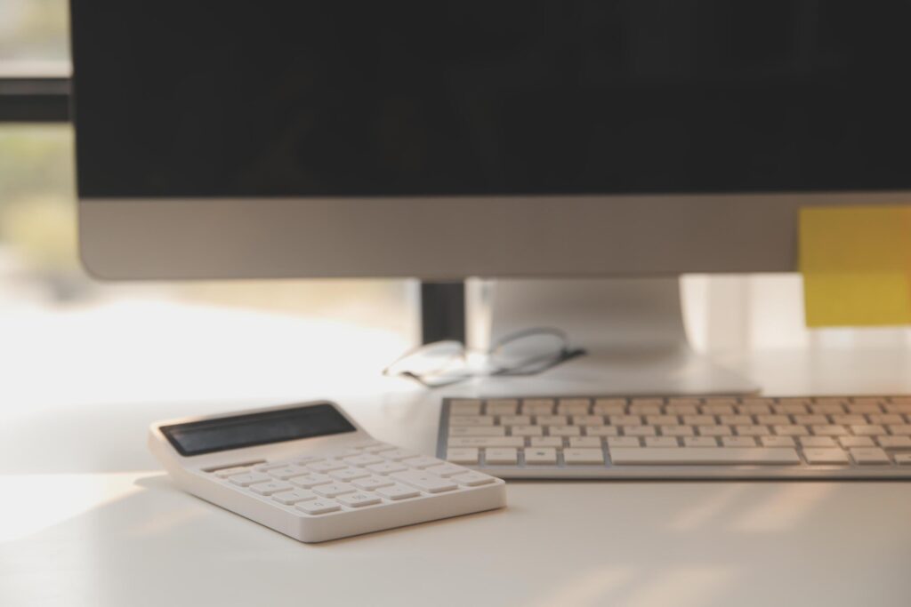 messy office workspace. Messy and cluttered office desk. Messy business office with piles of files and disorganized clutter. Stock Free