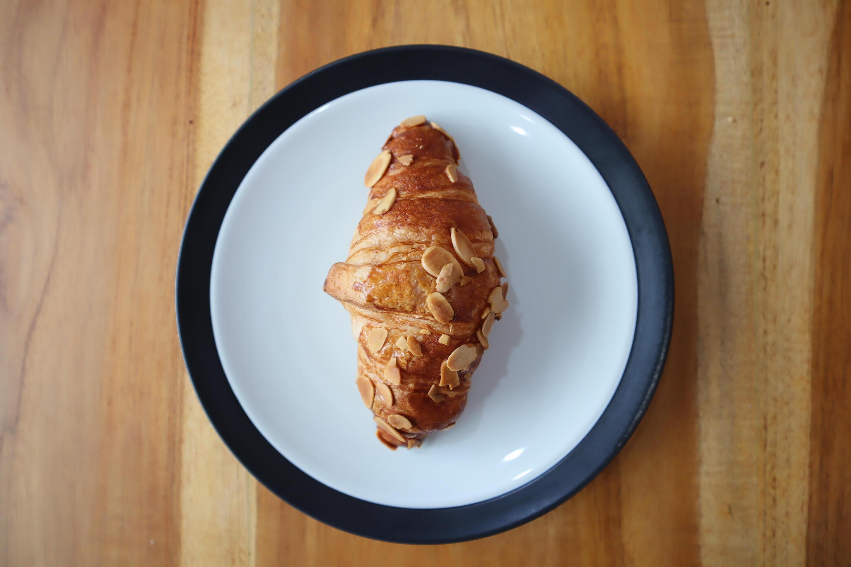 Milk Almond Croissant On table background Stock Free