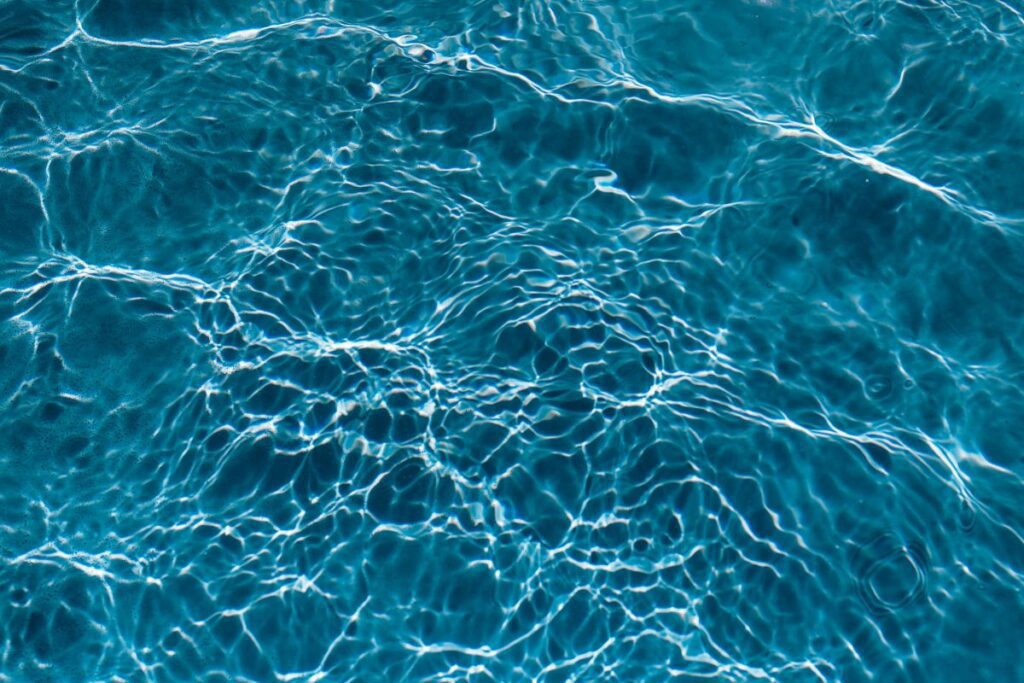 Wavy water surface in a swimming pool Stock Free