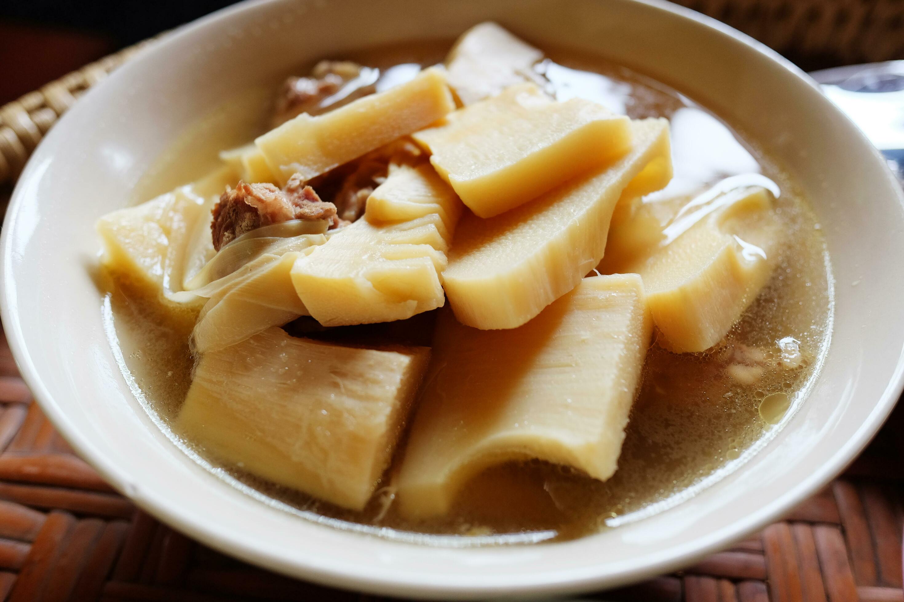 Homemade Bamboo Shoot boiled with pork bones soup in white bowl is tradition thai food. Stock Free