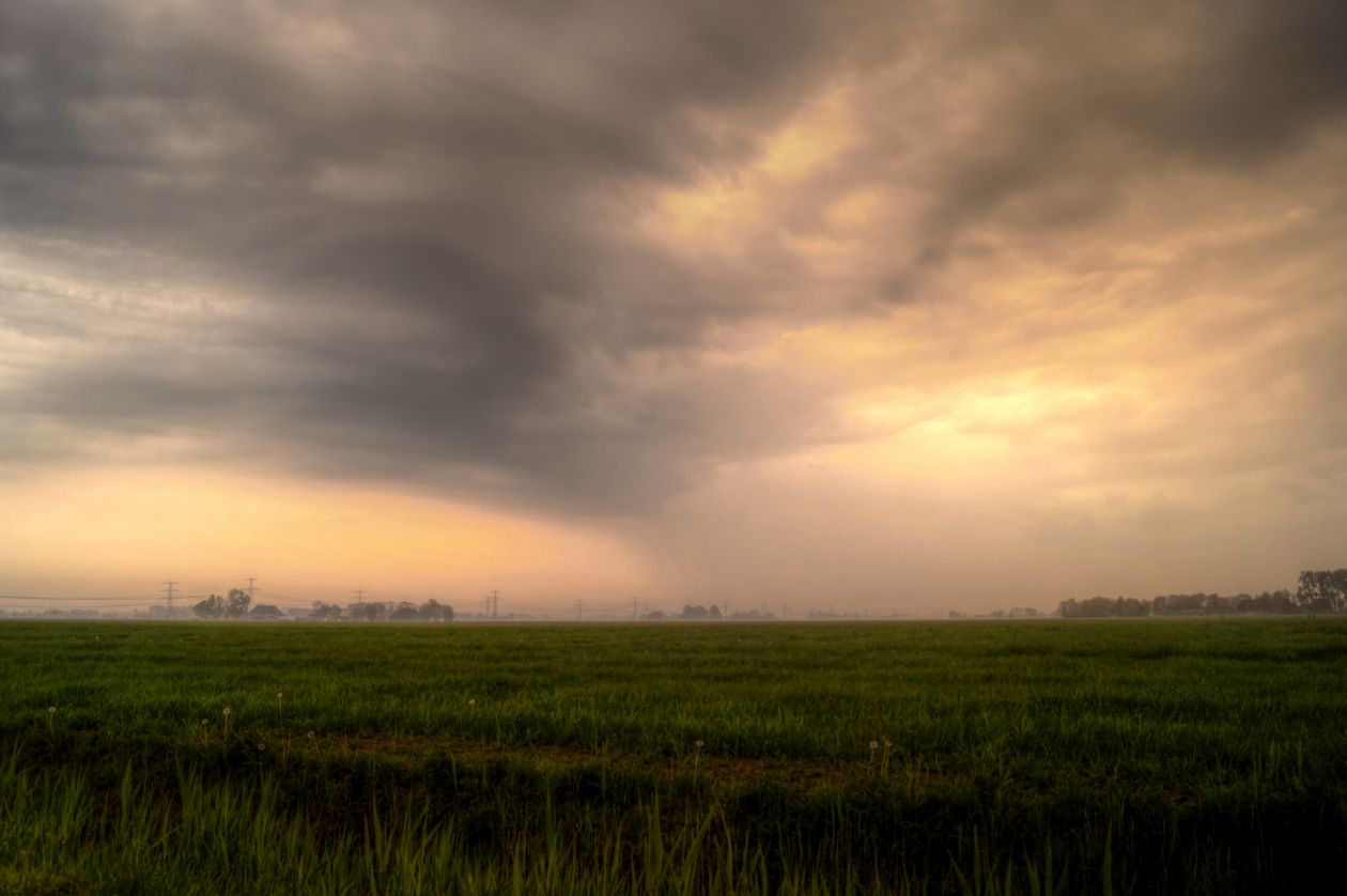 Sunny and rainy dutch landscape Stock Free