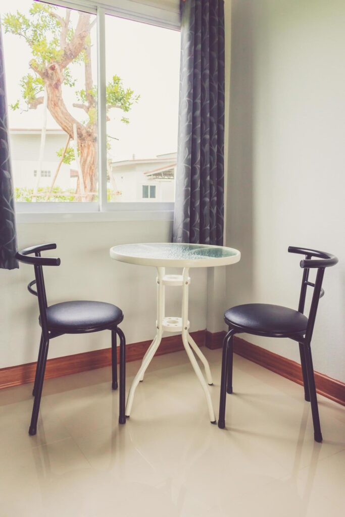 View of empty room with wooden table and chair in resort Stock Free