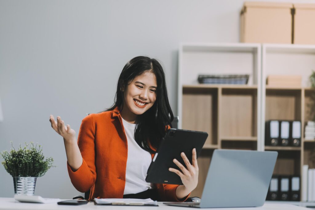 Happy executive sales business woman cheering excited in celebration after good news. achieving goals, success concept Stock Free