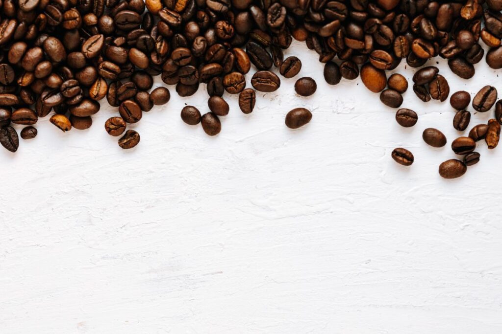 Dark roast coffee beans background Stock Free