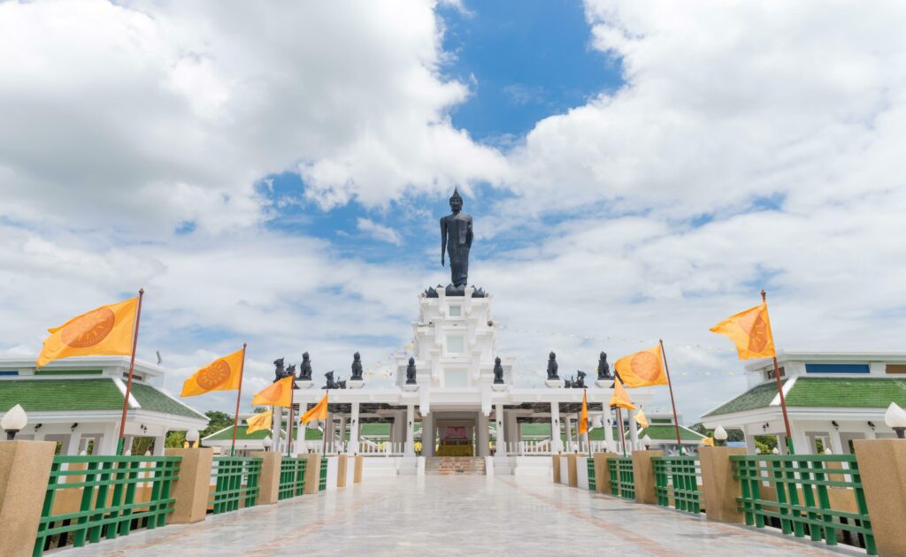 Black Big Buddha statue with white cloudy and blue sky Stock Free