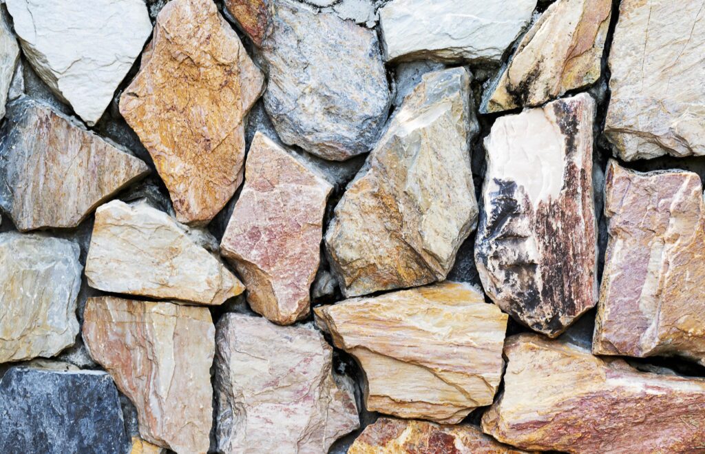 Colorful stone brick exterior wall background Stock Free