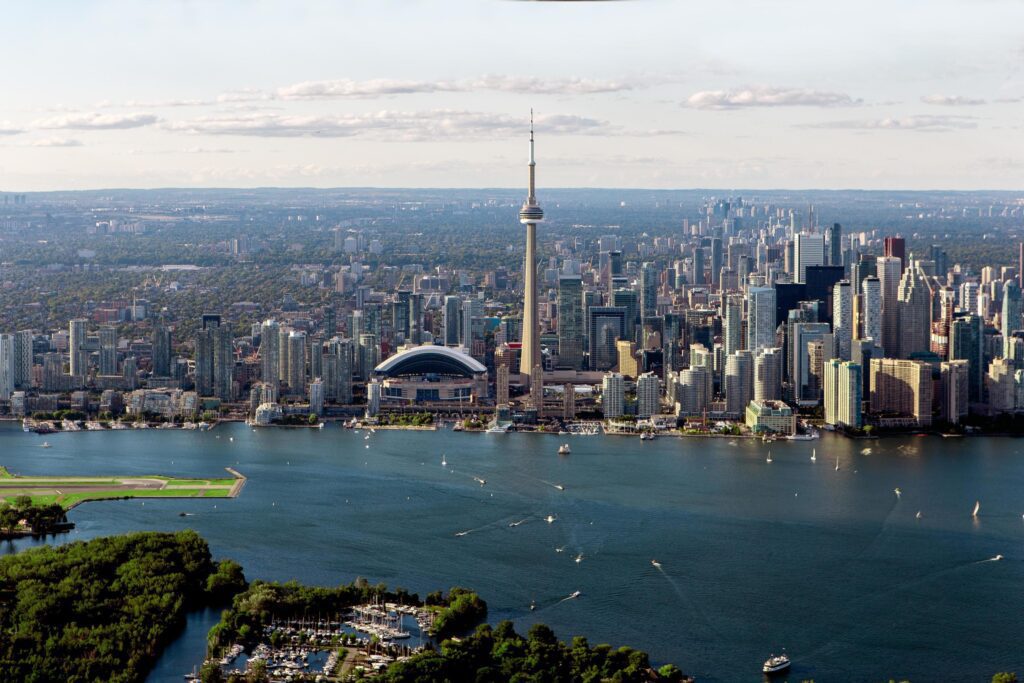 Gray buildings near body of water in aerial photo Stock Free