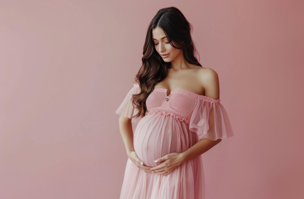 Pregnant Woman Posing on Pink Background Stock Free