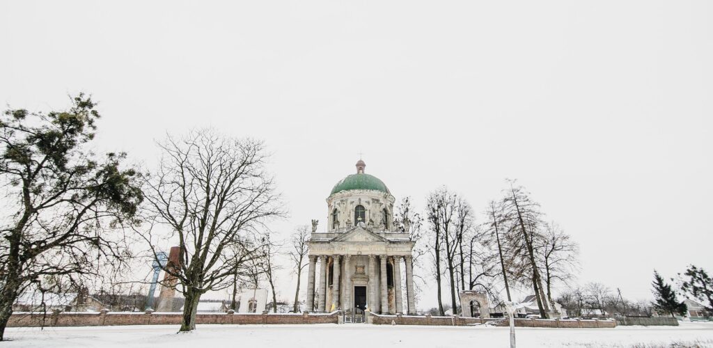 Roman Catholic Church of Saint Joseph. Old historic buildings detail stone wooden sculptures magnificent ornaments. Pidhirtsi village, Lviv Oblast, Ukraine, February 20, 2019 Stock Free